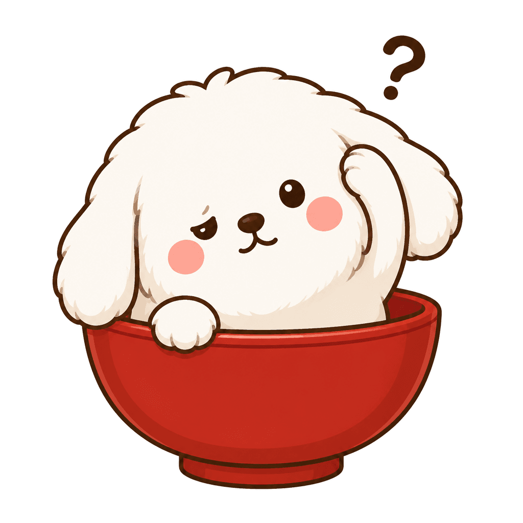 Wanko, a fluffy white dog sitting in a red Japanese bowl